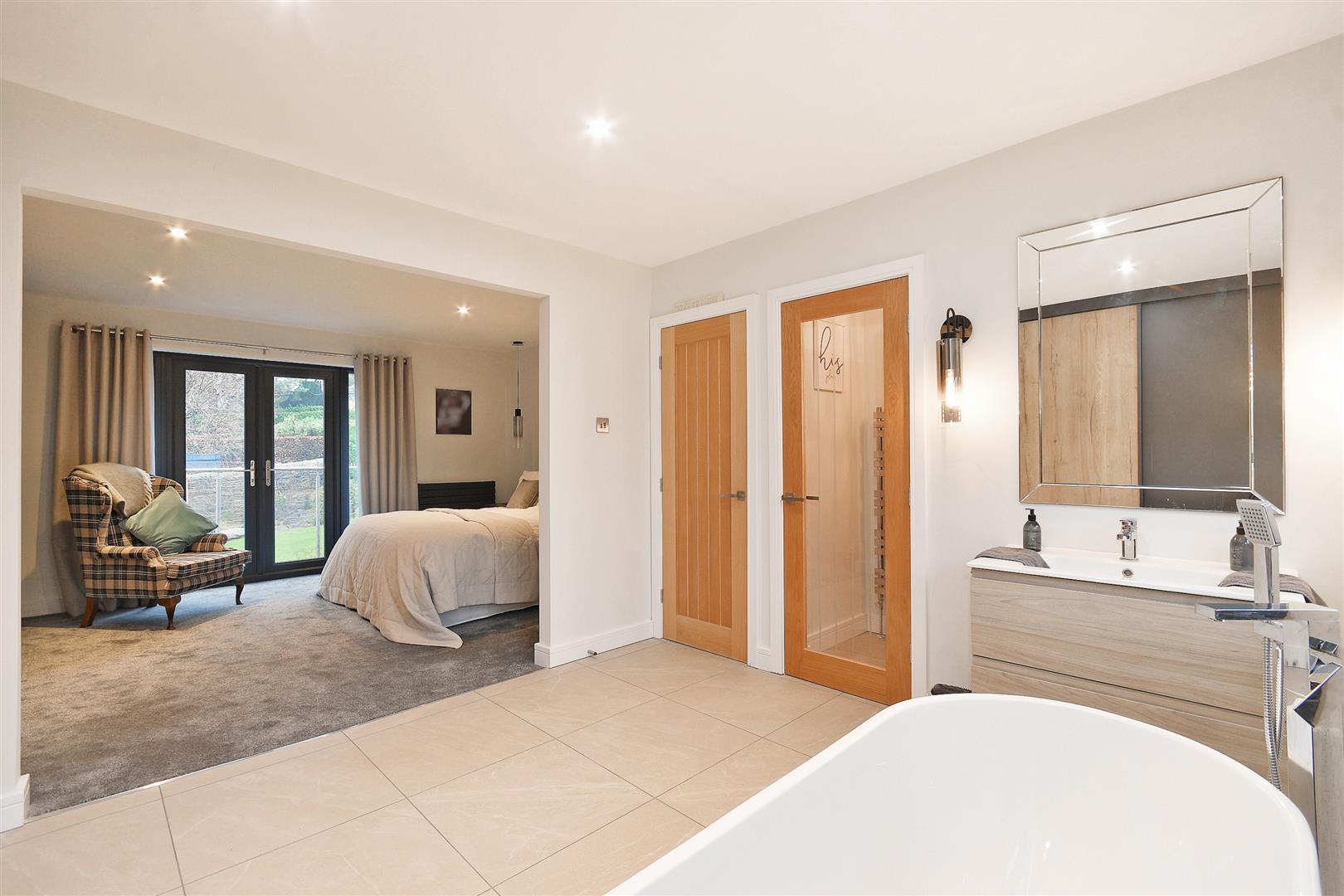 Blurred bath and bed through 2.jpg